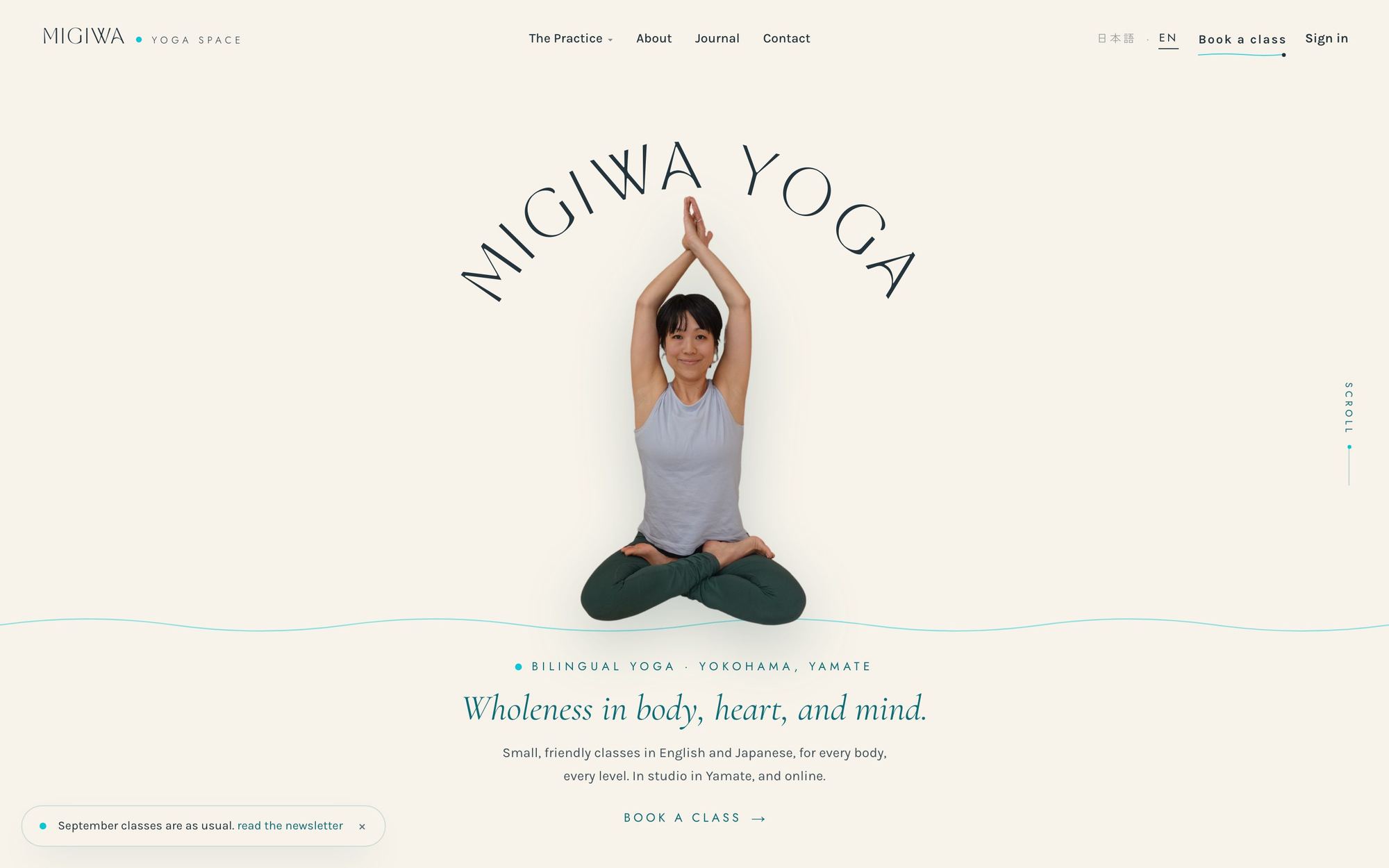 The Migiwa Yoga Space home page on a laptop